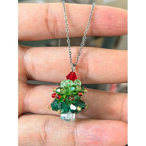 Weihnachtlicher Acrylschmuck für Damen – festliche Baumkette und Ohrringe mit roten Schleifen, perfekt für Weihnachtsfeiern und Feste. Image