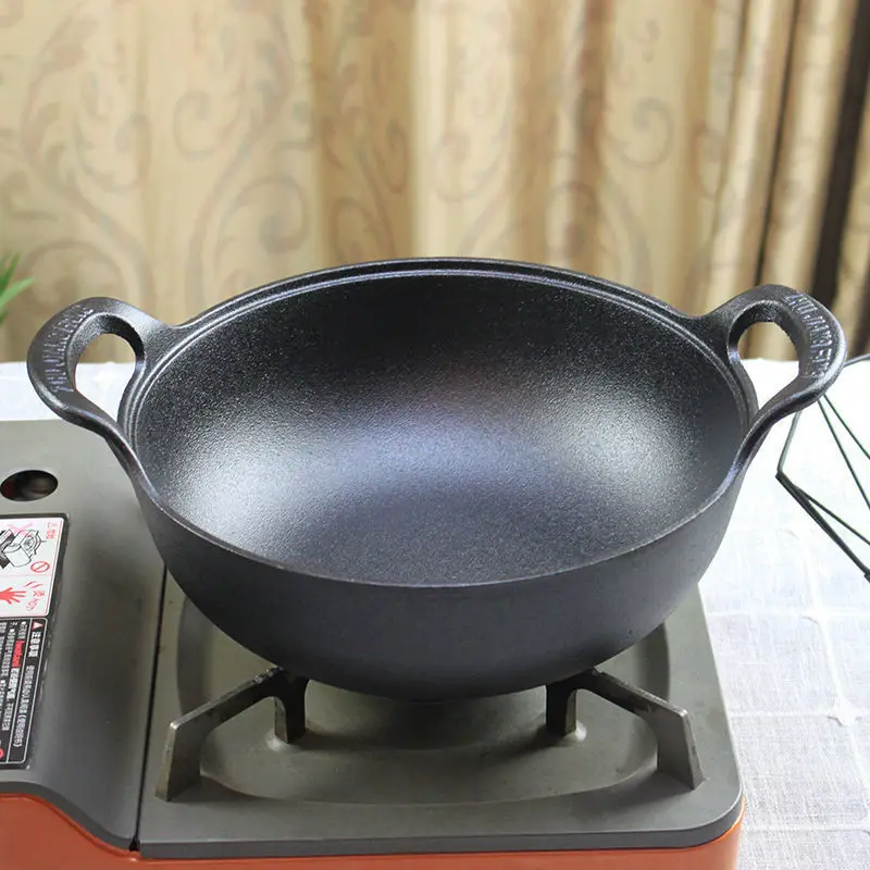 Verdickte altmodische Tiefbratpfanne aus Gusseisen, spezielle Doppelohr-Eisenpfanne mit elektromagnetischem Herd, Bratpfanne mit flachem Boden Image