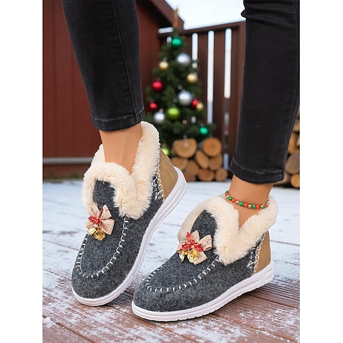 Warme, flauschige Damenschuhe aus Plüsch für Weihnachten und den Winter – mit niedlicher Schleife und Glöckchen, ideal für gemütliche Stunden zu Hause, zum Beschenken am Weihnachtsmorgen und als Winterkleidung. Image