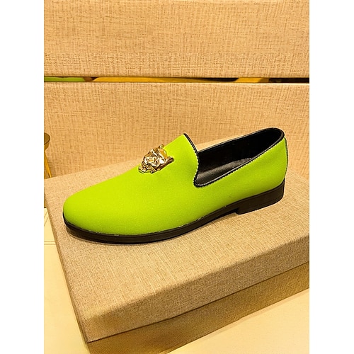 Gelbe Herren-Slipper mit Löwenemblem, auffällige und trendige Freizeitschuhe, ideal für modische Events, ungezwungene Treffen, besondere Anlässe und Hochzeiten. Image