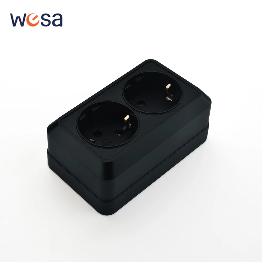 Schwarze Steckdosen mit Erdungssteckdosen, klassische Wandoberflächenfarbe, flammhemmende Steckdosen aus Kunststoff, EU-Standard Image
