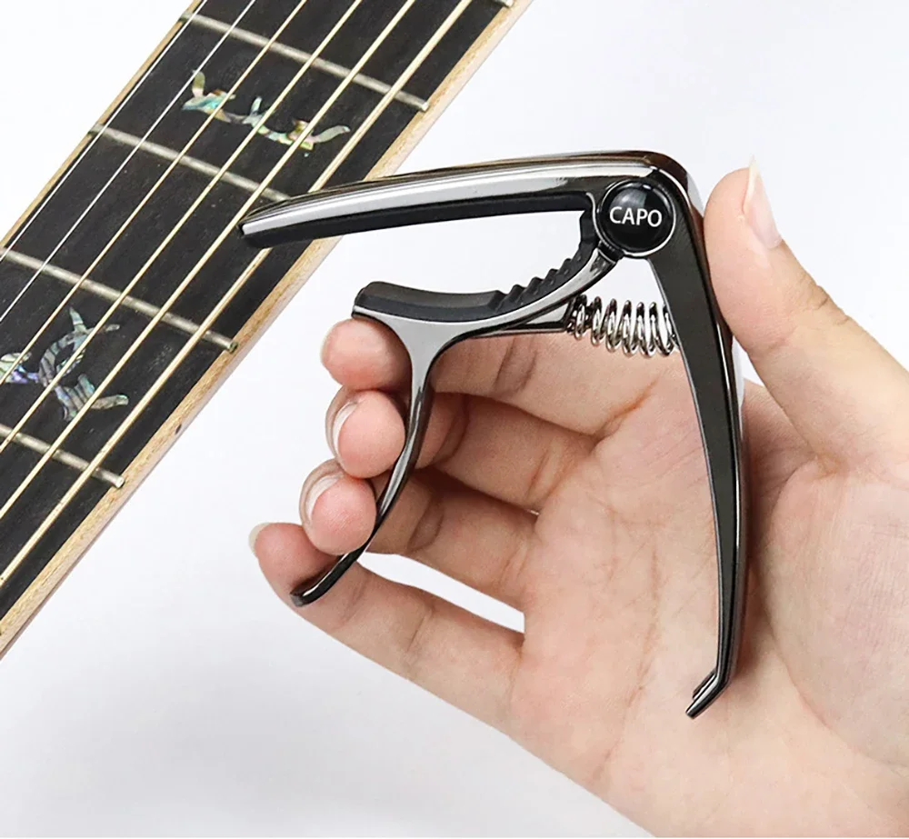 Gitarren-Kapodaster aus Metall, Zinklegierung, Stimmklemme, professioneller Schlüssel-Trigger-Kapodaster für akustische E-Gitarren Image