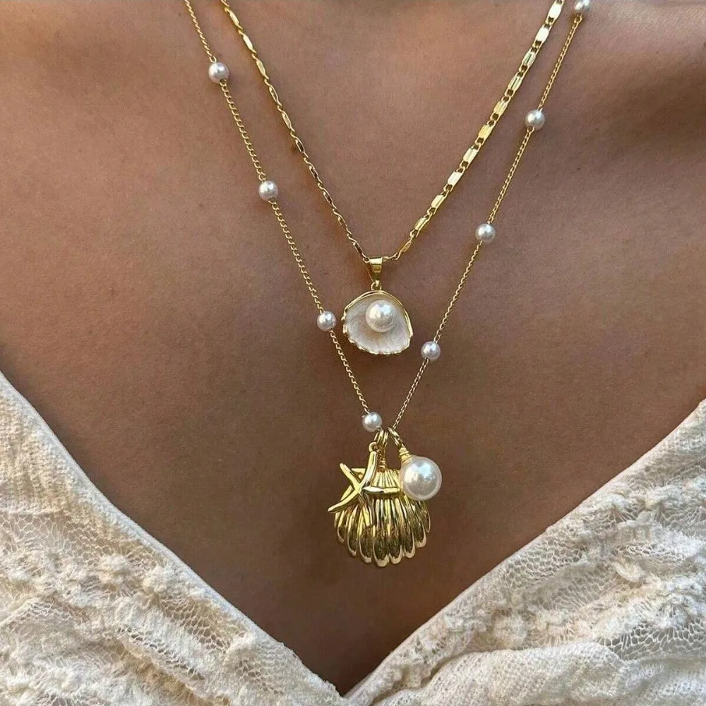 Set da 2 pezzi Moda Boho Colore oro Conchiglia marina Stella marina Ciondolo Catena di perle Collana multistrato pieghevole per set di gioielli da donna