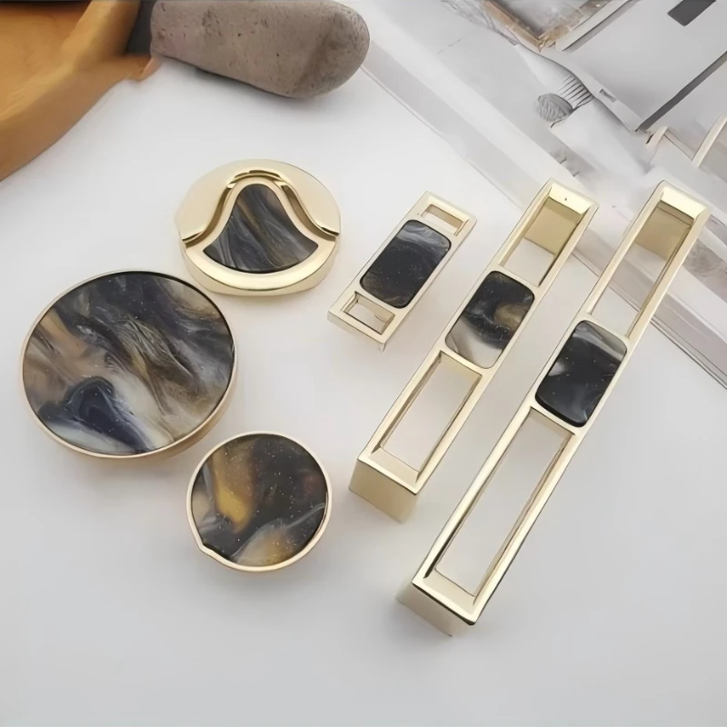 Ausgefallene, ausgehöhlte, schwarze Griffoberfläche aus Zinklegierung mit goldfarbenen Muscheln und perlmuttartigen Glitzermustern für Schubladen, Kleiderschränke und Schränke
