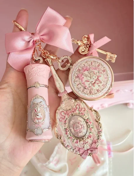 Blumen-Huazhixiao Hasen-Garde Mini-Schminkspiegel Handgehaltener Feuchtigkeitsspendender Lippenbalsam Kosmetik-Werkzeug-Serie Image