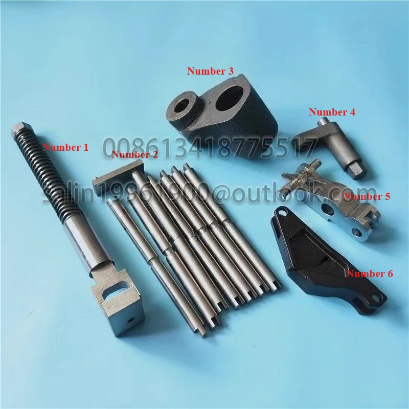 Roland 700 Automatikplatten-Installationszubehör, Platte beißen, Drehmomentstange, Verbindungsblock, Druckhammer, Plattenmontagesitz Image