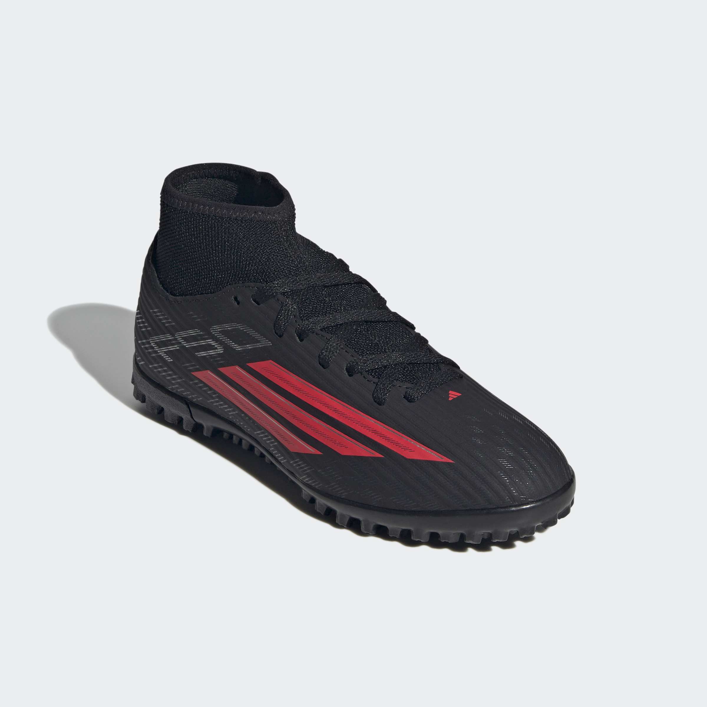 Fußballschuh ADIDAS PERFORMANCE "F50 CLUB MID CUT TURF KIDS", Mädchen, Gr. 31, core schwarz, lucid rot, core schwarz, Synthetik, Textil, Schuhe Fußballschuh, für Kunstrasen, Hart- und Aschenplätze, für Kinder & Jugendliche
