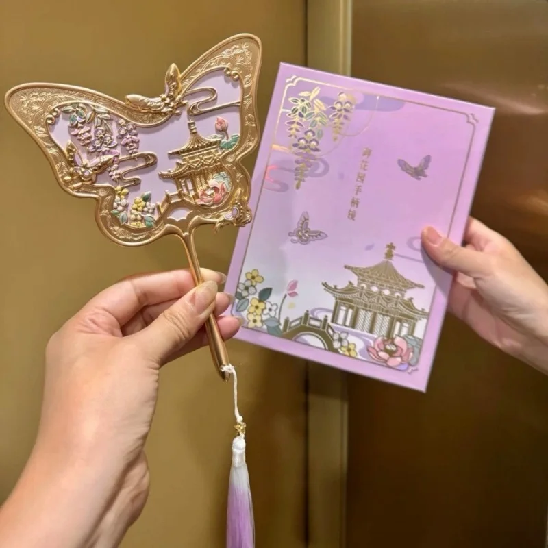 Neuer exquisiter Stil-Spiegel, tragbarer Spiegel, Klappspiegel, Griffspiegel, kultureller und kreativer tragbarer Make-up-Spiegel im antiken Stil Image