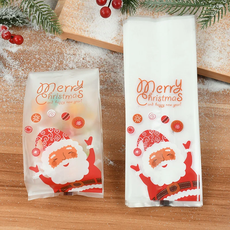 25 Stück Kekstüten mit Weihnachtsmotiv, transparente Weihnachtsmann-gemusterte Taschen, frohe Weihnachten und frohes neues Jahr für Weihnachts-Keksverpackungen Image