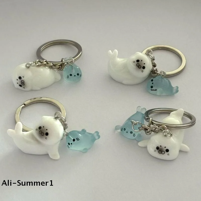 【E】1/2/4 Stück Cartoon 3D Leuchtender Seelöwen-Schlüsselanhänger Niedlicher Tier-Taschenanhänger Dekoration Autoschlüsselring Paar-Geschenk Image