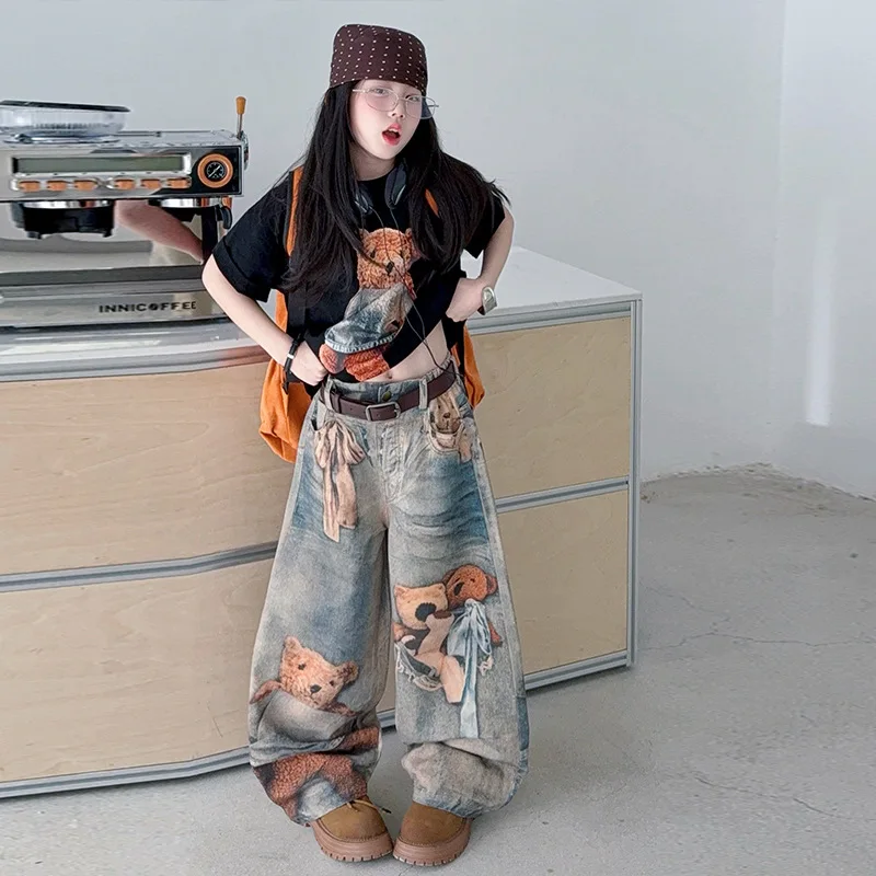 Teenager-Mädchen Amerikanischer Stil Schickes Schwarzes Baumwoll-Cartoon-T-Shirt für 4-14 Jahre Junior-Kinder Weit geschnittene Jeans Outfit-Set Image