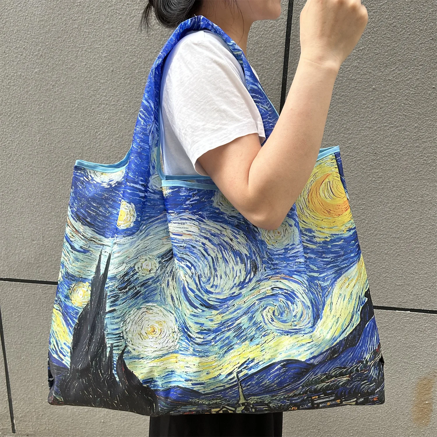 Einkaufstaschen, reißfeste, faltbare Einkaufstasche, tragbare Schulterhandtasche, feuchtigkeitsbeständige Reisetasche für den Einkauf von Lebensmitteln Image