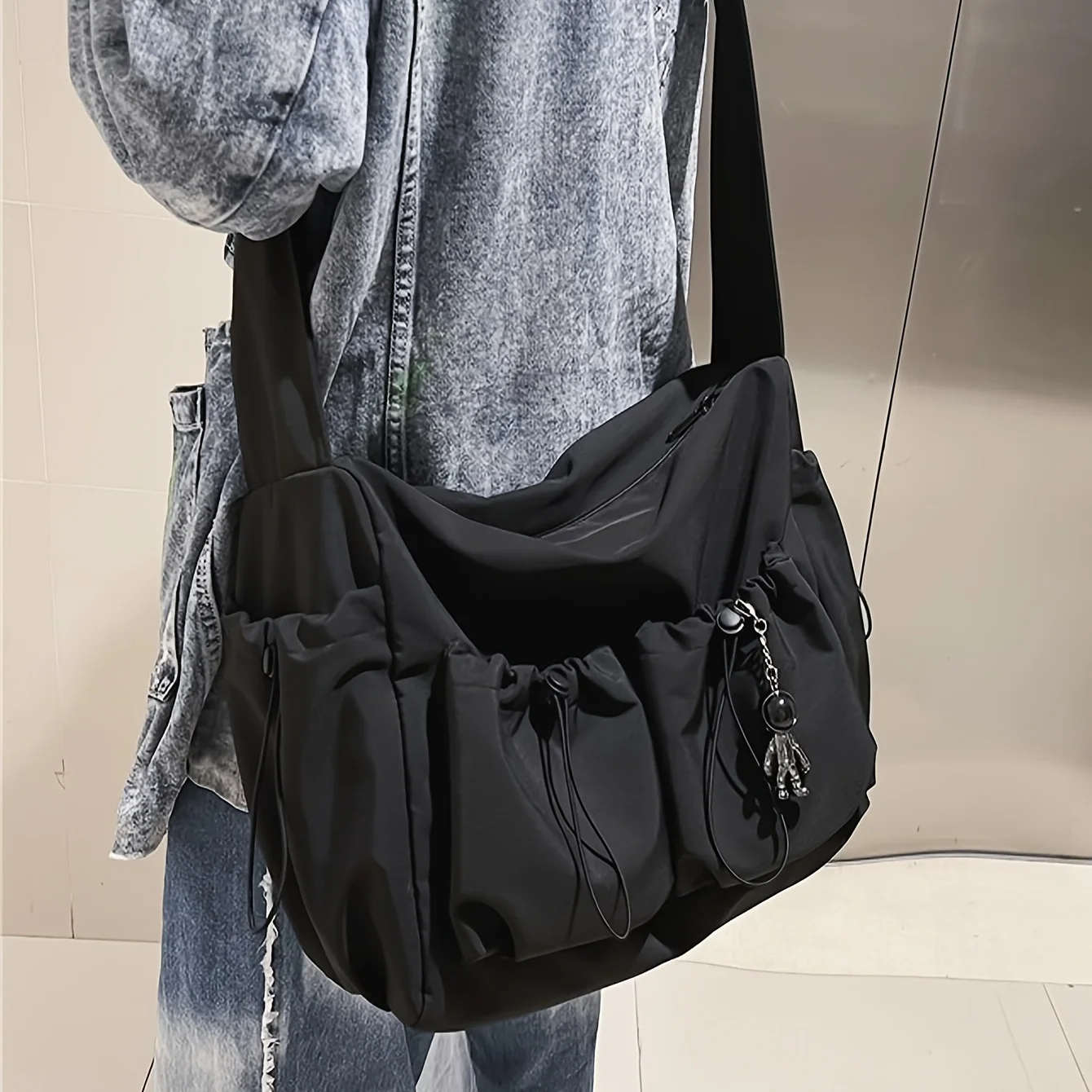 Fashionable Crossbody Bag With Drawstring Accent Spacious Zippered Closure & Stylish Bag Charm Fashionable Crossbody Bag With Drawstring Accent Spacious Zippered Closure & Stylish Bag Charm