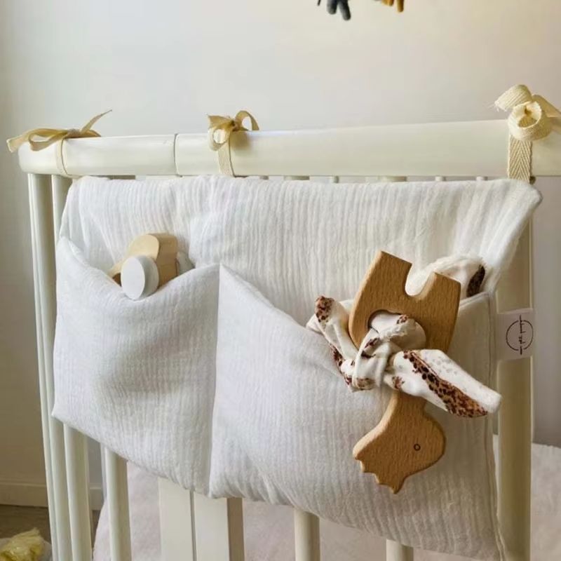 Nursery Crib & Bed Organizer Storage Bag With Hanging Diaper Pockets white