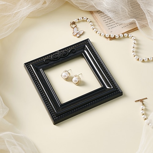 Quadratischer Ausstellungsrahmen mit dreidimensionalem Harzmuster, ideal zum Selbermachen, perfekt als Fotorequisite oder für die Dekoration kleiner Wohnungen. Image