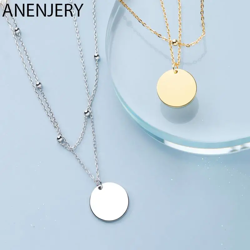 ANENJERY Collana con ciondolo a disco rotondo a doppio strato Collana con ciondolo a catena con perline color oro per gioielli da donna