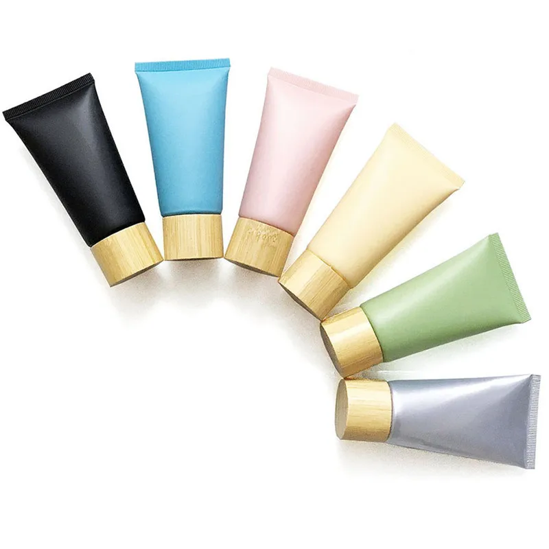 Commercio all'ingrosso 50/60/80/100/120ml bottiglie di crema per tubi flessibili tappo di legno crema tubi morbidi compongono contenitori di Base tubi riutilizzabili cosmetici