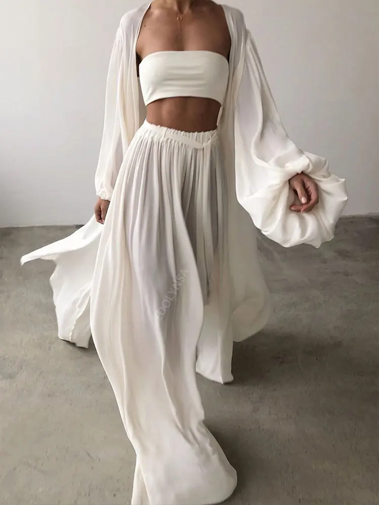 Set di tre pezzi sexy in tinta unita 2025 Autunno Donna Top a tubo Abito da spiaggia Crop Top Pantaloni Cardigan a maniche lunghe Set da 3 pezzi A1642