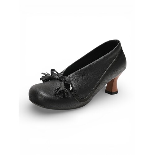 Weiße Vintage-Pumps aus Leder im Stil der 1950er-Jahre – Retro-Mod-Pumps mit zweifarbigem Blockabsatz und Schleifenverzierung, elegante Schuhe mit niedrigem Absatz. Image