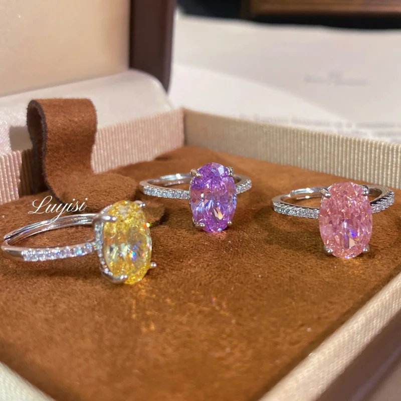 Reichhaltiger und eleganter Designer-Verlobungsring mit rund geschliffenem rosa Kristall, geeignet für Frauen. Einzelner, versteckter, runder Diamantschmuck Image