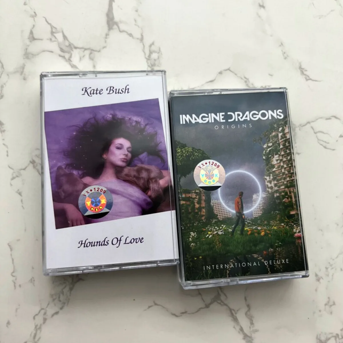 Kate Bush Hounds of Love & Imagine Dragons Origins Kassette Alternative Pop-Rock-Musikalbum zum Hören und Sammeln Image