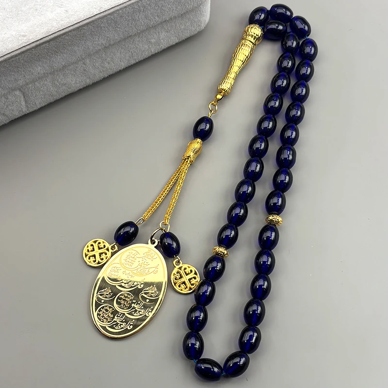 Islamischer Koran-Anhänger für Frauen und Männer aus Edelstahl in Goldfarbe mit blauen Glas-Gebetsperlen-Kette als Schmuckstück Image