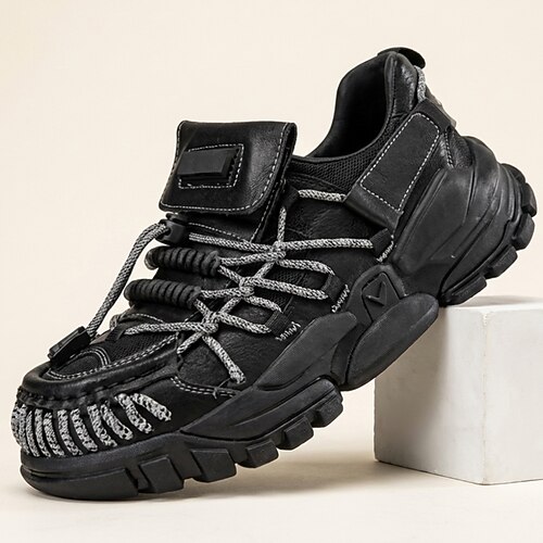 Schwarze, strapazierfähige und atmungsaktive Schnür-Sneaker für Herren aus echtem Leder – ideal für Outdoor und Freizeit. Image
