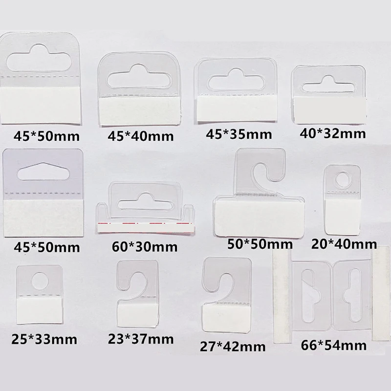 100 Stück PVC-Schlitzloch selbstklebende Hängelaschen Haken Waren Paket Box Taschenaufhänger Peghooks Display für Store Retail Display Image