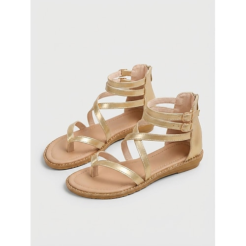 Goldene Gladiator-Sandalen für Damen – flache Riemchensandalen mit Zehensteg für Strand und Urlaub auf Inseln. Image