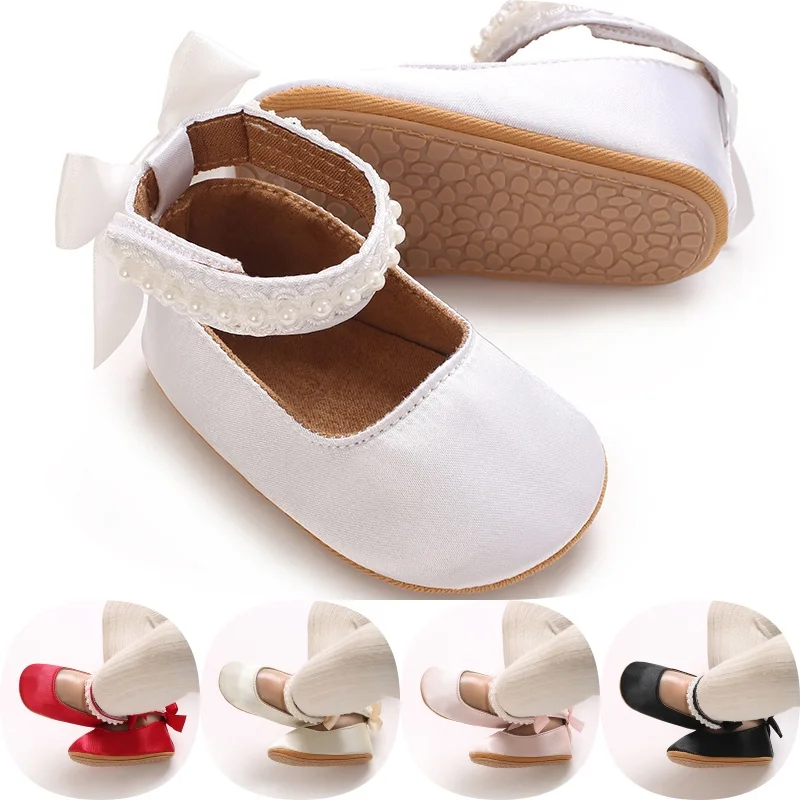 Süße Lederschuhe für Babys im Alter von 0-18 Monaten, neue Prinzessinnenschuhe mit Perlen und Schleife, weiche Gummisohle, rutschfeste Lauflernschuhe