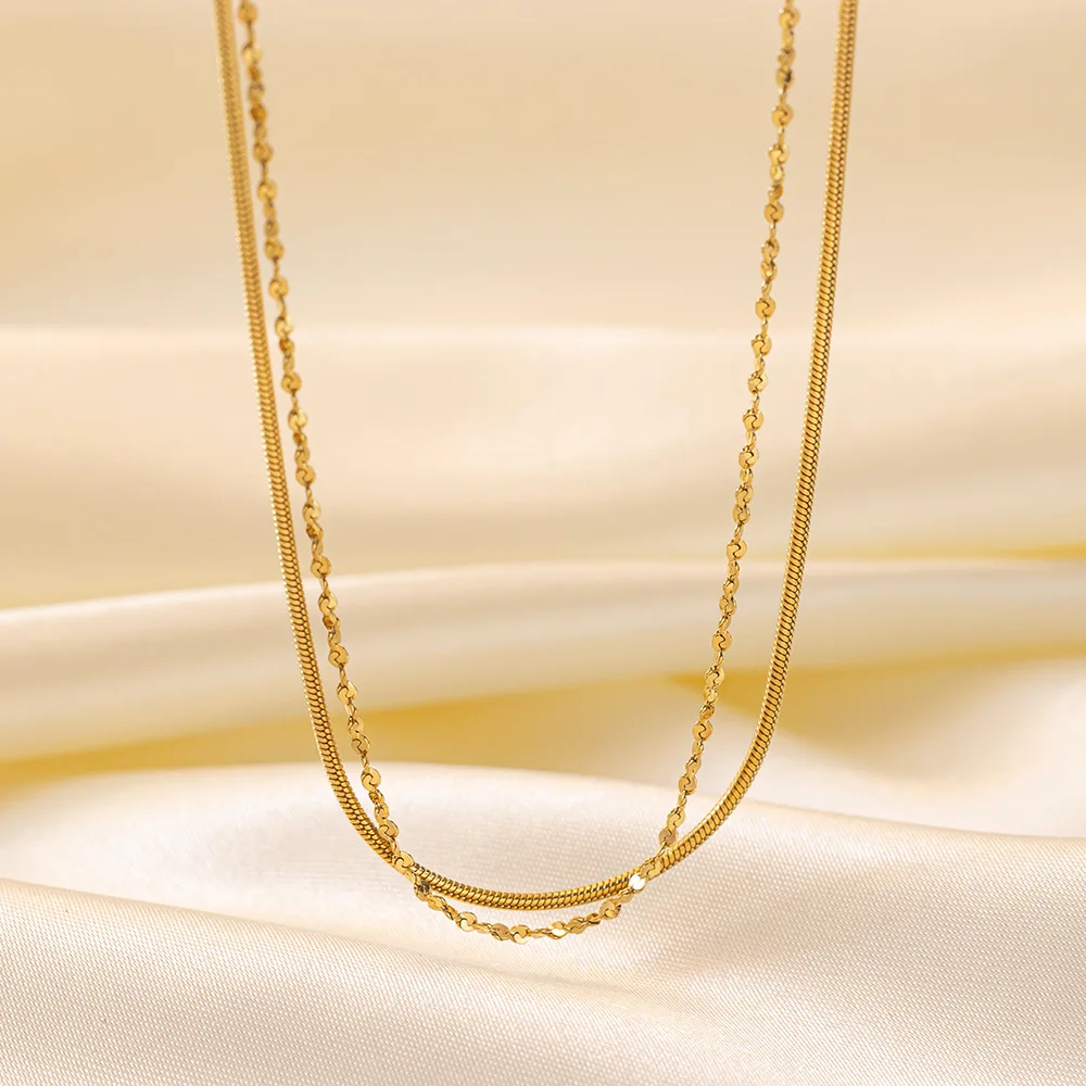 Collana a doppio strato con osso di serpente da donna in acciaio inossidabile placcato oro 18K collana a catena con osso di serpente gioielli