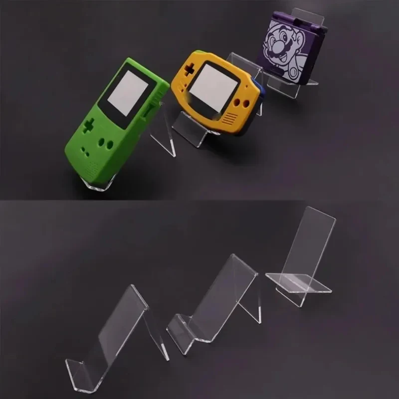 Verschiedene Schreibtischhalterungen für Gameboy GB GBC GBA GBP PSP NDS PSV Psvita Spielkonsolen Ausstellungshalterung Acryl-Displayständer Image