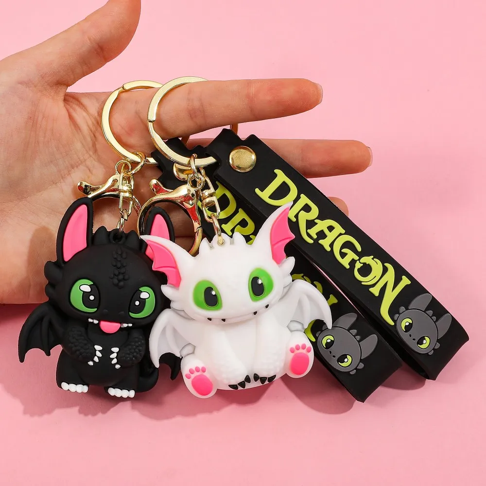 artoon Anime Big Eyes Schwarz und Weiß Kleiner Drache Schlüsselanhänger Paar Cartoon Rucksack Auto Schlüsselanhänger Charm Anhänger Geschenke