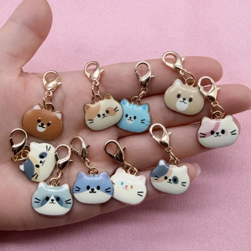 10 Stück Schlüsselanhänger aus Legierung mit Öltropfen-Print und Katzenkopf, geeignet für Taschenanhänger, die beste Wahl für Geschenke Image