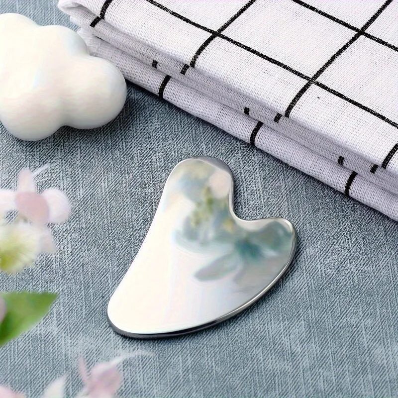 Gua Sha-Brett aus Edelstahl, Sommerkühlung, hellbeiges Anziehwerkzeug und Verbesserung von Augenringen, professionelles Beauty-Set Image