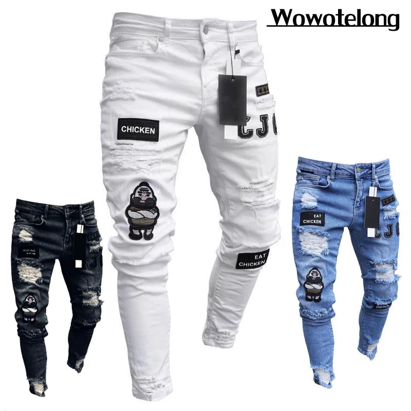 Cartoon Stickerei Jeans Männer Baumwolle dehnbare zerrissene Röhrenjeans hochwertige Hip Hop Black Hole Slim Fit Overs ize Jeans hose