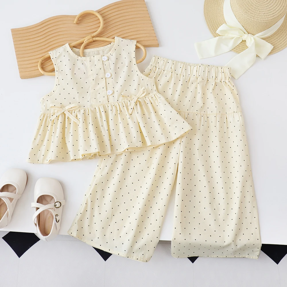 Bear Leader Baby-Mädchen-Freizeitkleidung, Rundhalsausschnitt, ärmelloses Polka-Dot-Oberteil + Hose mit weitem Bein, 2-teiliges Set mit Schleife und Knopf Image