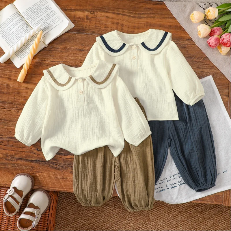 Kinderkleidung im koreanischen Stil für Frühling und Herbst, neue Modelle für Damen und Herren, langärmlige Oberteile im Universitätsstil mit B. Image