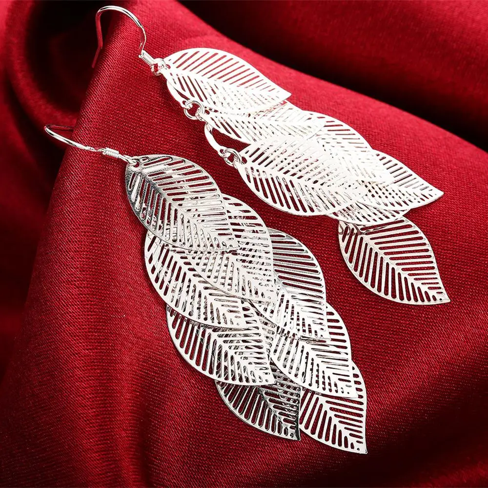 Ohrringe Modeschmuck Frau geschichtet hohle Blätter Quaste lange Tropfen Ohrringe Silber Farbe Trendsetter Weihnachtsgeschenke Image