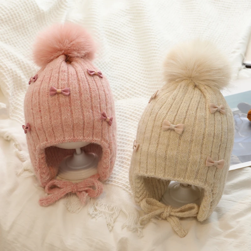 Prinzessin Kinder Winter Hut für Mädchen Pompom Bögen Kinder Motorhaube Hut Warme Ohren Verdicken Kinder Mädchen Kappe Faux Pelz Ball 2-6Y Image