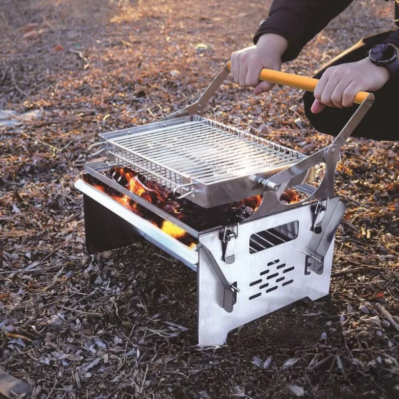 Abnehmbarer Klapp-Holzkohlegrill Tragbarer Outdoor-Drehgrill für den Haushalt Image