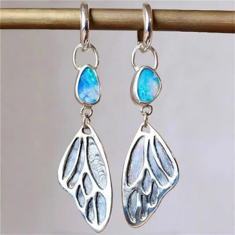 Vintage zarte Schmetterlingsflügel-Ohrringe in Silberoptik für Damen, elegante, einzigartige synthetische Aquamarin-Schmuckaccessoires für festliche Anlässe Image