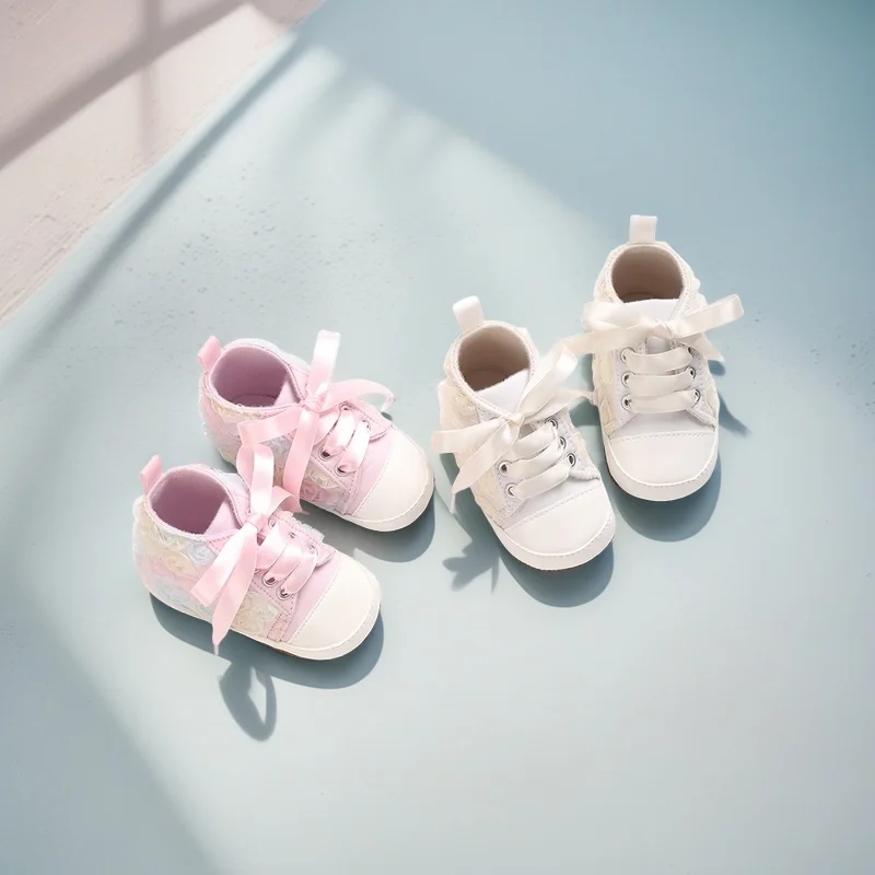 Neue Babyschuhe für Neugeborene im Alter von 0 bis 18 Monaten, klassische Canvas-Schuhe mit niedlicher Schleifenverzierung, lässige Sportschuhe, erstes Paar Wanderschuhe