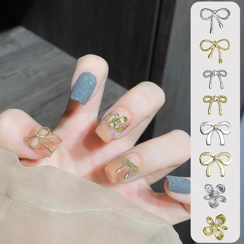 20 Stück Schleifenförmige Blumen-Nagelcharms aus Metall in Gold und Silber, Gemischte 3D-Nagelrhinestones, Glitzernde Nageldekoration, Maniküre-Zubehör Image