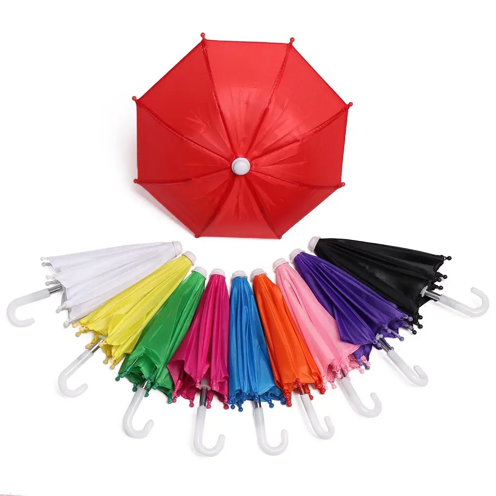 Neue Stil Bunte Kunststoff Mini Regenschirm Regen Getriebe Spielzeug Regenschirm Baby Spielzeug Mädchen Geschenk Puppe Verschönerung Puppe Kleidung Dekoration