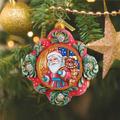 G Debrekht Treasured Memories Gift Giver Santa Ornament Plastic in Green/Red | 3 H x 3.5 W x 1.5 D in | Wayfair 6102546