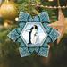 G Debrekht Derevo Penguin Snowflake Ornament Plastic in Black/Blue/White | 3 H x 3.5 W x 1.5 D in | Wayfair 6102173