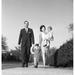 Family with daughter and son walking in park Poster Print (18 x 24)