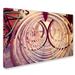 Trademark Fine Art 'Wheels' by Jason Shaffer Photographic Print on Wrapped Canvas Metal in Indigo/Orange | 22 H x 32 W x 2 D in | Wayfair