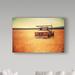 Trademark Fine Art 'Field Truck' Photographic Print on Wrapped Canvas Metal in Green/Red/Yellow | 22 H x 32 W x 2 D in | Wayfair ALI31083-C2232GG